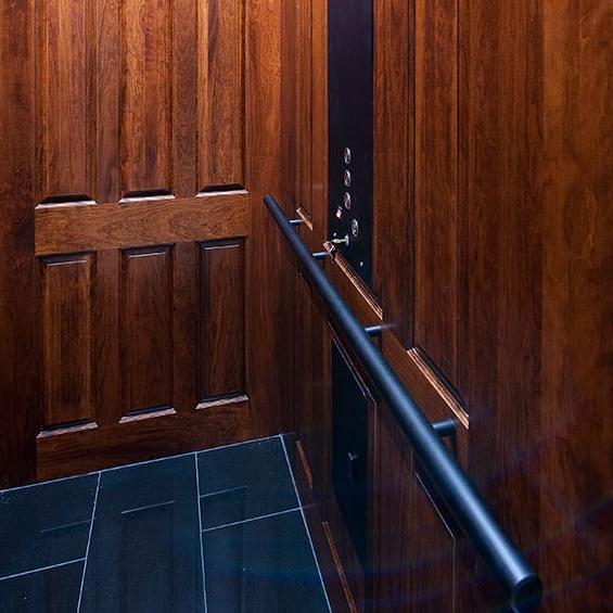 Indoor home wood walled elevator by Savaria